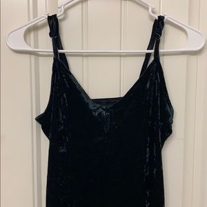 Black body hugging velvet dress